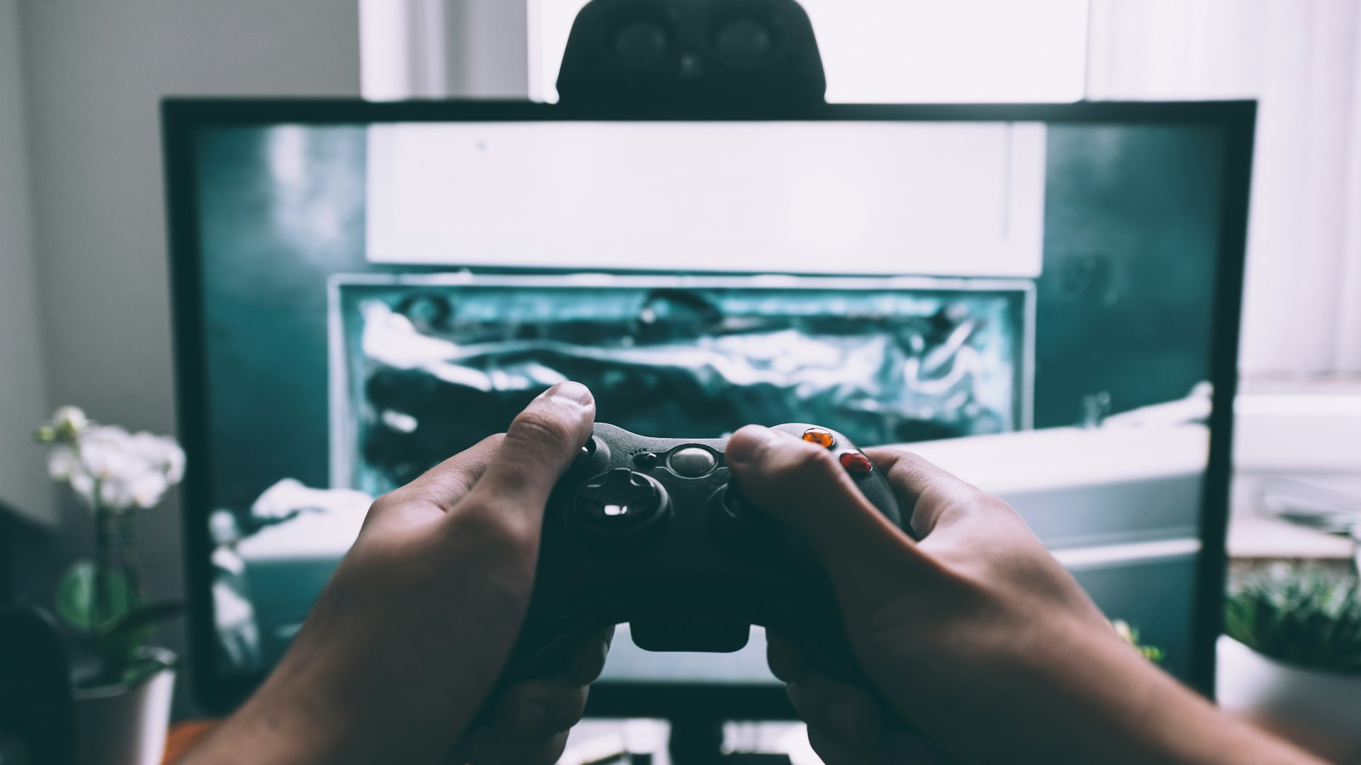 Neon-lit gaming setup at dusk